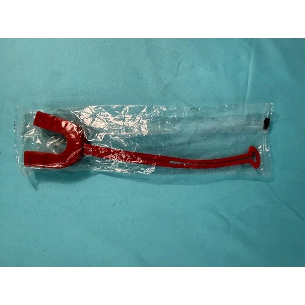 A red double-bite athletic mouthguard with an attached strap
